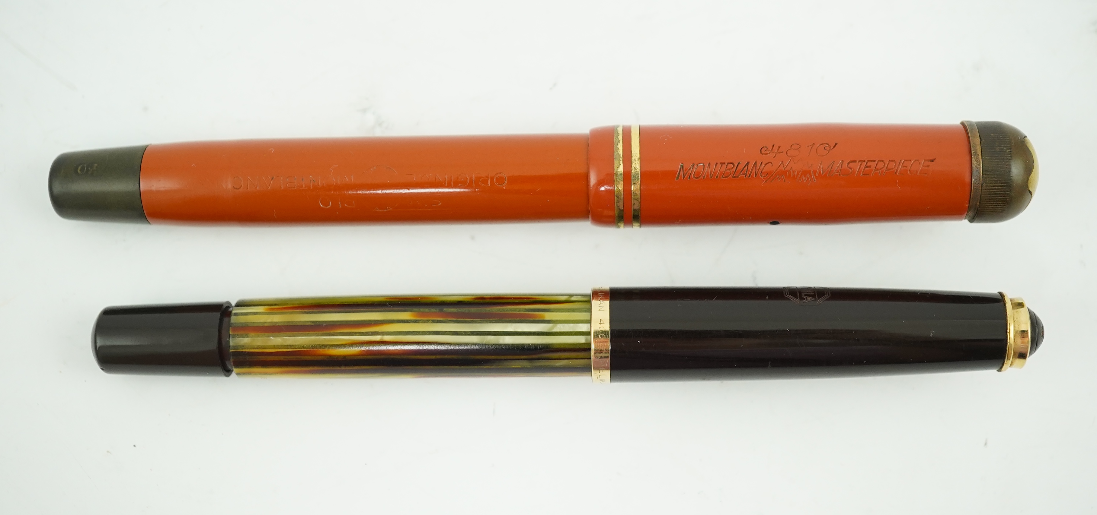 A Montblanc fountain pen, pencil plus a Pelikan fountain pen